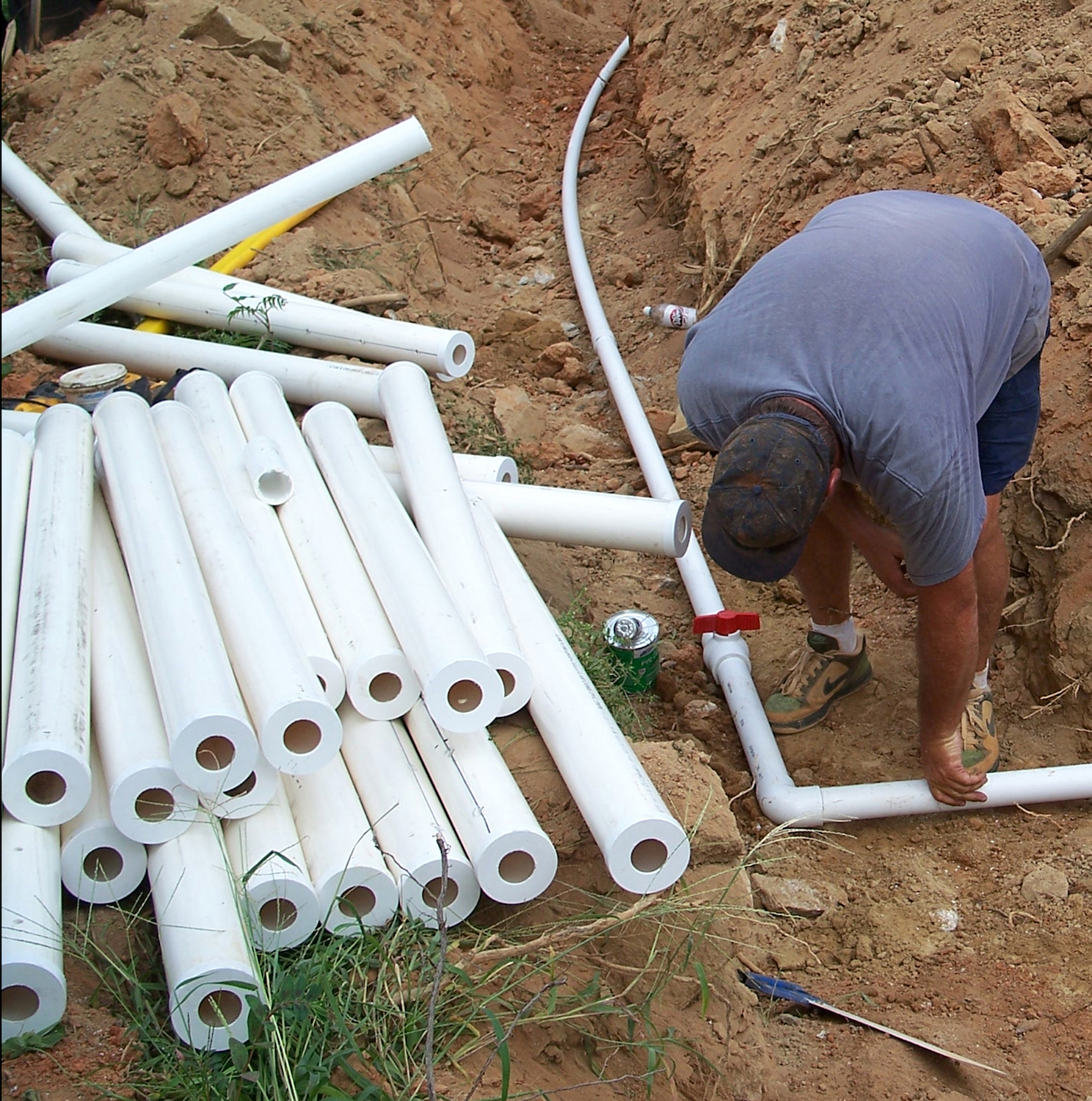 Both ends of the orifice shields – 4-foot-long PVC pipe – are plugged with end caps into which centered 2-inch holes have been drilled for the 1.50-inch PVC distribution pipe. (Photo by Kaylinn Gilstrap)