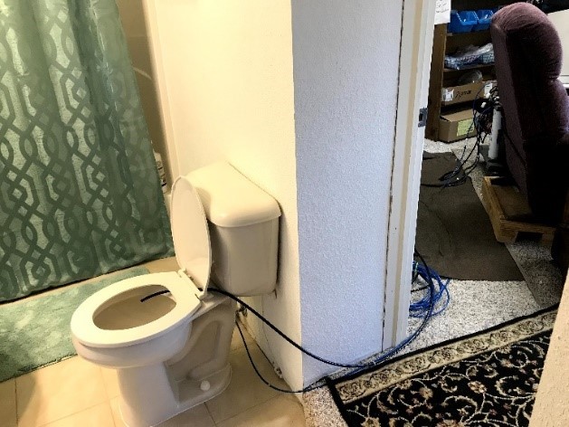The homeowner's hemodialyzer is plumbed directly into the toilet.